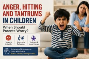 Angry child having a tantrum while a concerned parent watches in the background.