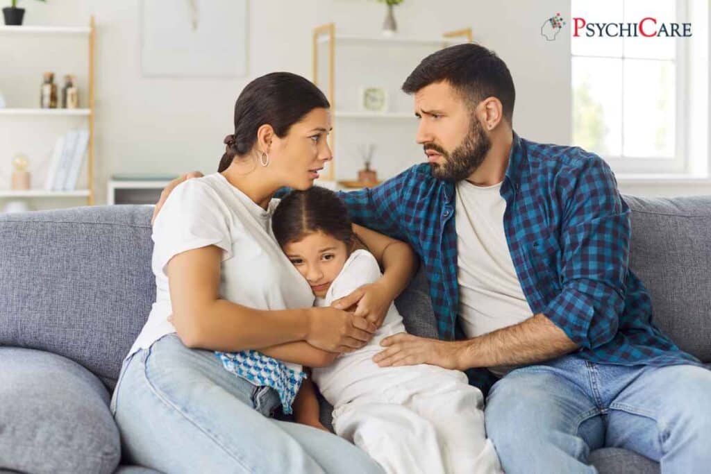 Anxious child showing signs of worry and overthinking while sitting quietly at home.
